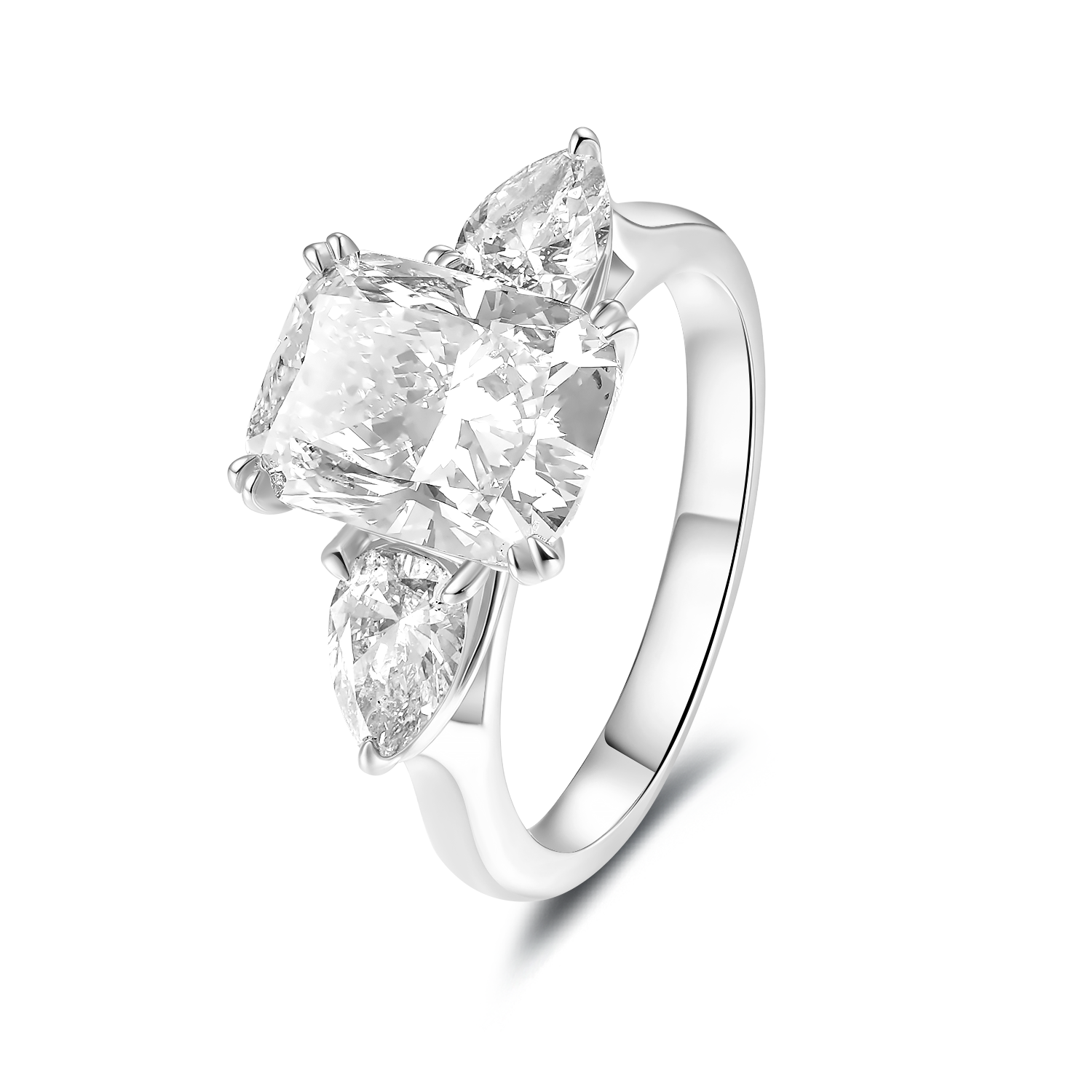 THREE-STONE CUSHION DIAMOND RING